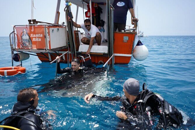 3-Hours Shared Tour to Accessible Boat en Canary Island - The bay swim stop with snacks and soft drinks