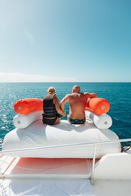 Costa Adeje: Private Yacht Trip with Watersports and Slides - Los Cristianos: the break and the sightseeing rhythm