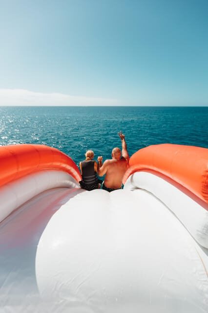 Costa Adeje: Private Yacht Trip with Watersports and Slides - Palm-Mar’s Aquatic Cave area: a scenic stop with swim energy