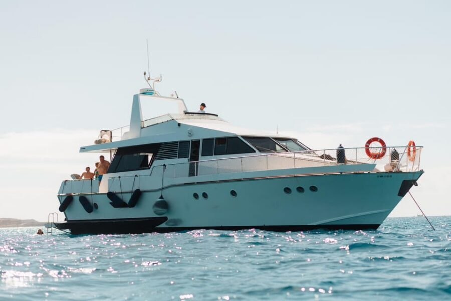 Costa Adeje: Private Yacht Trip with Watersports and Slides - Where you meet and how boarding usually feels