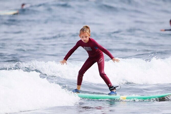 Group Surf Class in Playa de Las Américas with Photographs - Playa de las Américas: a practical place to learn surf