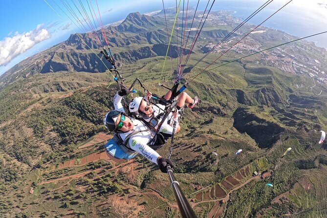 SILVER 1000m paragliding tandem flight above South Tenerife - In the air: thermals, narration, and optional acrobatics near landing
