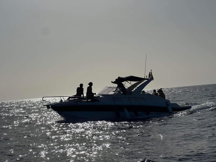 Tenerife: Private Boat Charter with Tapas & Drinks - Onboard comfort: bow sun pads, interior cabins, and your own bathroom