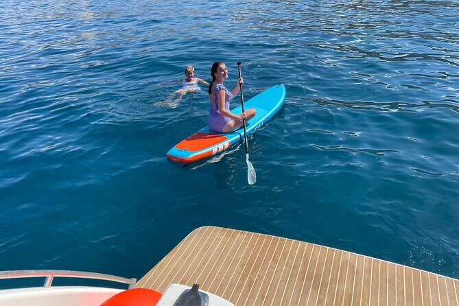 Whales and Dolphins excursion on a Luxury Yacht in Canary Islands - Stop 2: Los Cristianos cliffs for snorkeling, swimming, and relaxed time at anchor